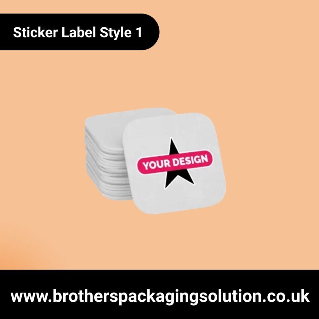 Stack of square sticker labels with rounded corners on a peach background. The top sticker displays a black star and "Your Design" in bold text.