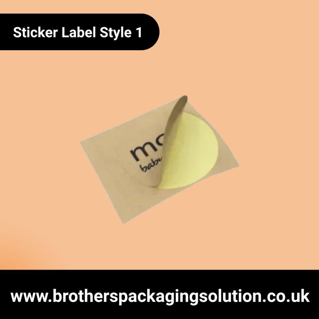 A brown rectangular sticker partially peeled, revealing a circular yellow label underneath. Text reads "Sticker Label Style 1." Background is peach.
